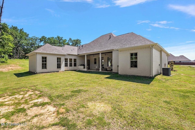 6603 Wirtz Rd, Flowood, MS 39232 - rear view of house featuring central AC unit, a lawn, ceiling fan, and a patio