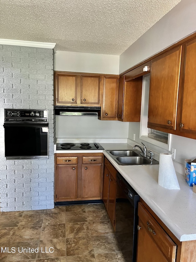 8301 Concord Cv, Southaven, MS 38671 - kitchen with a sink, brown cabinetry, black appliances, and a textured ceiling