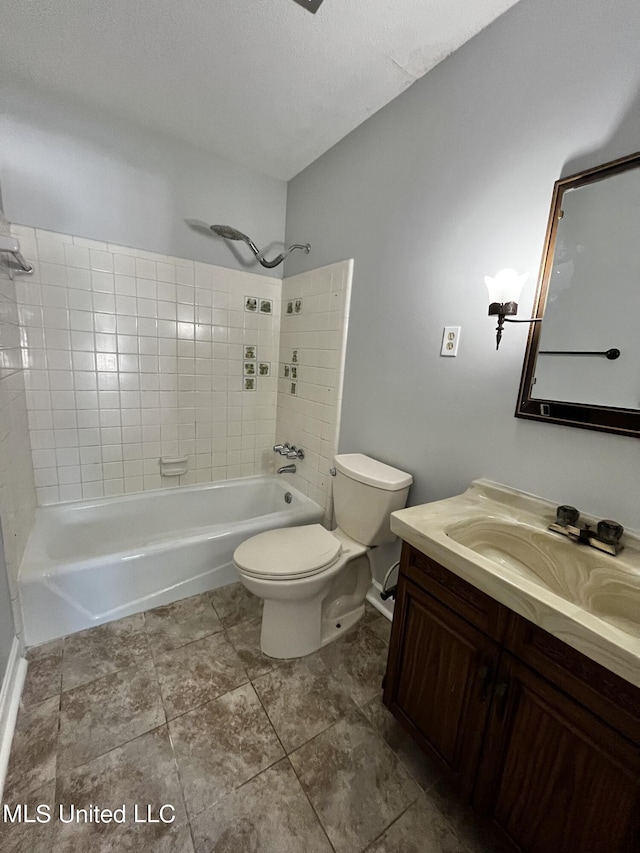 8301 Concord Cv, Southaven, MS 38671 - bathroom featuring toilet, shower / washtub combination, and vanity