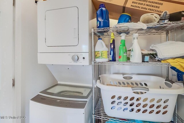 2421 Beachview Dr Unit D07, Ocean Springs, MS 39564 - washroom with stacked washer / drying machine
