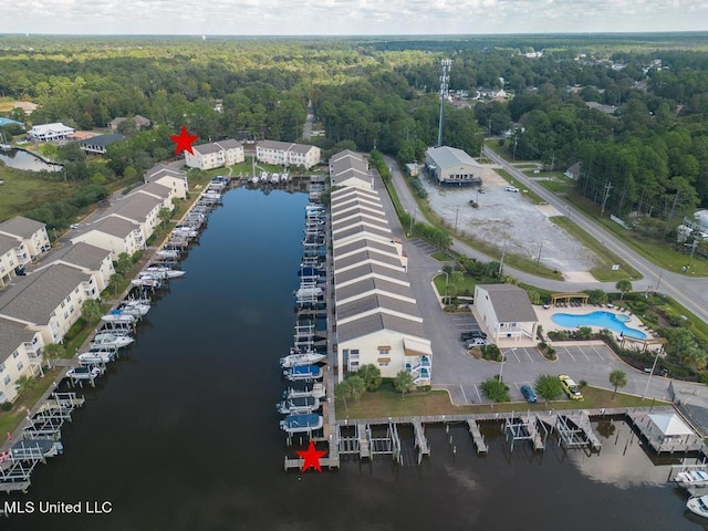 2421 Beachview Dr Unit D07, Ocean Springs, MS 39564 - aerial overview of property's location featuring a large body of water and a forest
