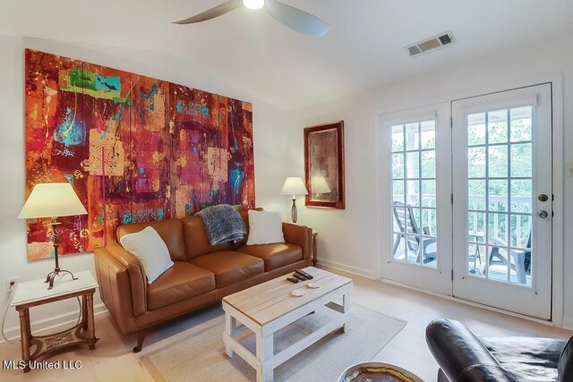 2421 Beachview Dr Unit D07, Ocean Springs, MS 39564 - living area with vaulted ceiling, ceiling fan, and baseboards
