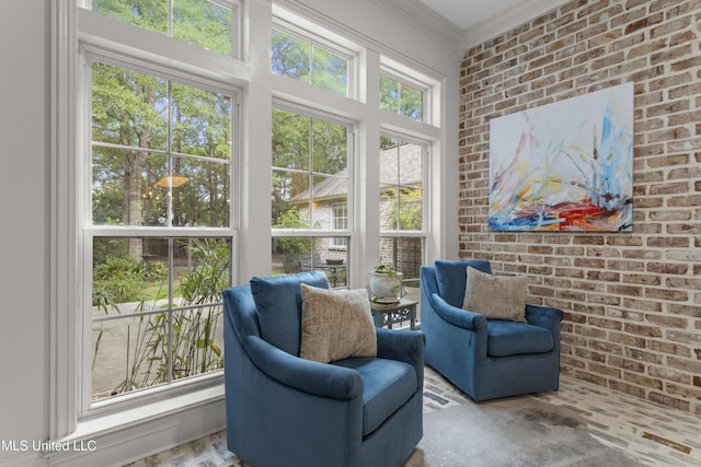 6416 Oliwa Pl, Diamondhead, MS 39525 - living area with brick wall and crown molding