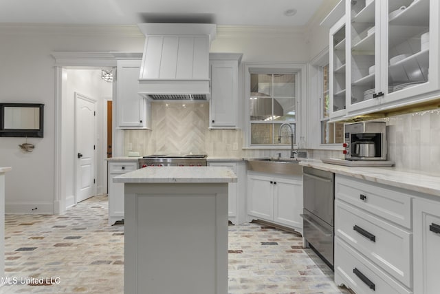 6416 Oliwa Pl, Diamondhead, MS 39525 - kitchen with brick floors, tasteful backsplash, white cabinets, dishwasher, and ornamental molding