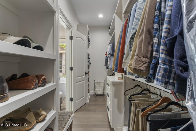 6416 Oliwa Pl, Diamondhead, MS 39525 - spacious closet with light wood finished floors