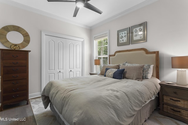 6416 Oliwa Pl, Diamondhead, MS 39525 - bedroom with a closet, ornamental molding, and ceiling fan