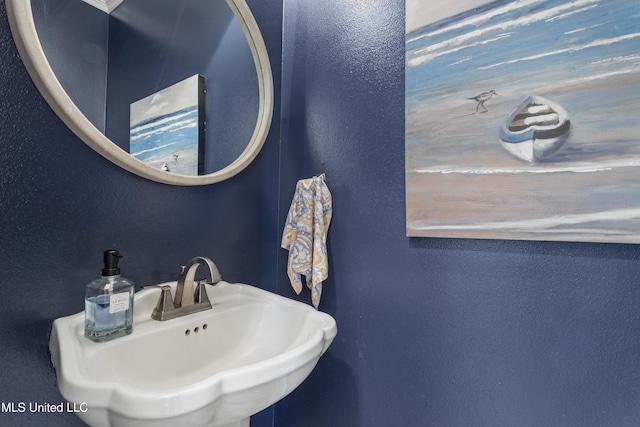 6416 Oliwa Pl, Diamondhead, MS 39525 - bathroom with a textured wall