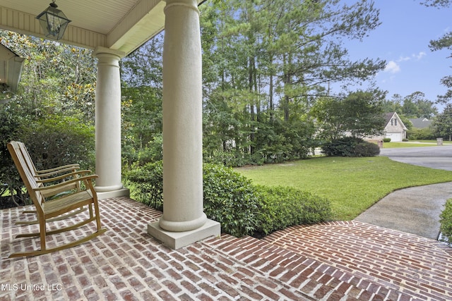 6416 Oliwa Pl, Diamondhead, MS 39525 - porch featuring a lawn