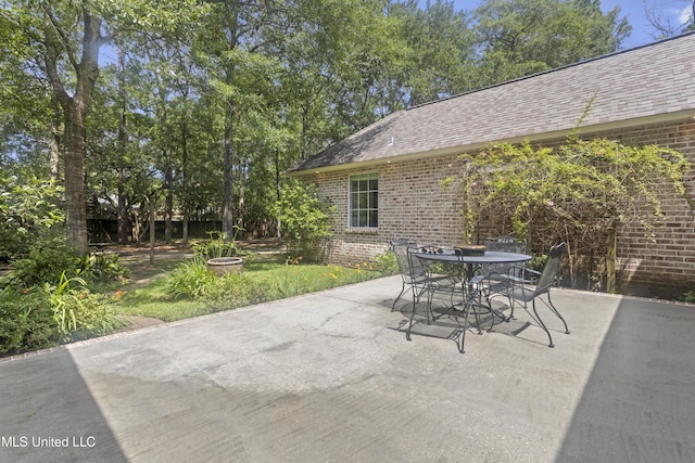 6416 Oliwa Pl, Diamondhead, MS 39525 - view of patio featuring outdoor dining area