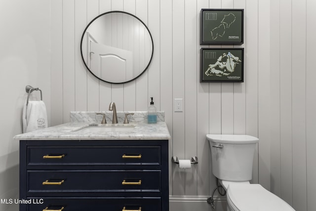 6416 Oliwa Pl, Diamondhead, MS 39525 - bathroom featuring vanity and toilet