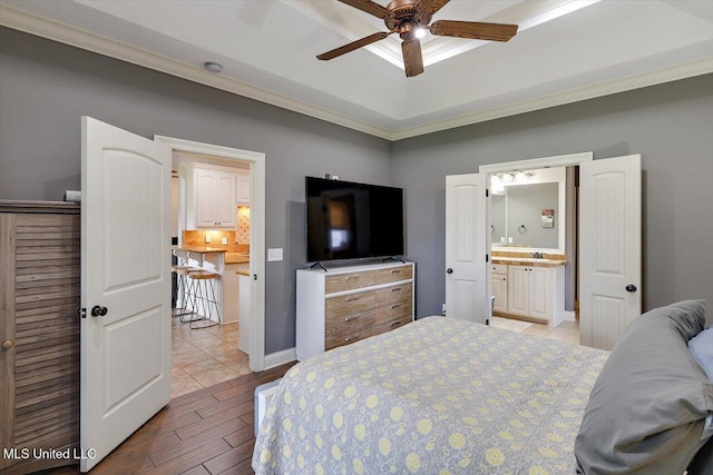159 Stillhouse Creek Dr, Madison, MS 39110 - bedroom featuring wood finished floors, crown molding, ensuite bathroom, and a sink