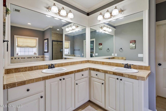 159 Stillhouse Creek Dr, Madison, MS 39110 - bathroom with double vanity, a tile shower, tile patterned floors, and ornamental molding