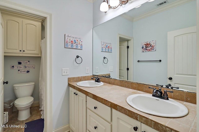 159 Stillhouse Creek Dr, Madison, MS 39110 - full bath featuring toilet, double vanity, ornamental molding, and tile patterned flooring