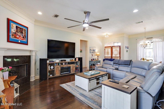 159 Stillhouse Creek Dr, Madison, MS 39110 - living area featuring a fireplace, a ceiling fan, dark wood-style flooring, a chandelier, and ornamental molding