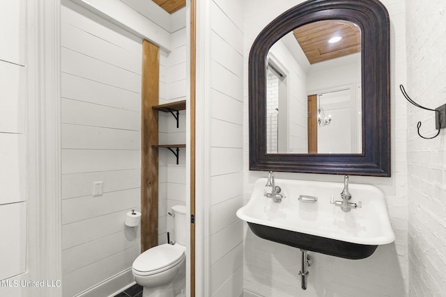 bathroom with toilet and sink