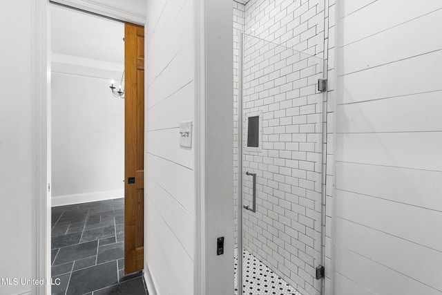 bathroom featuring an enclosed shower