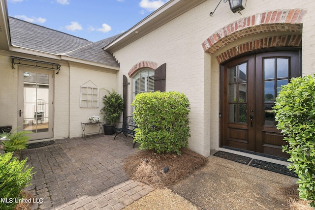 doorway to property with french doors