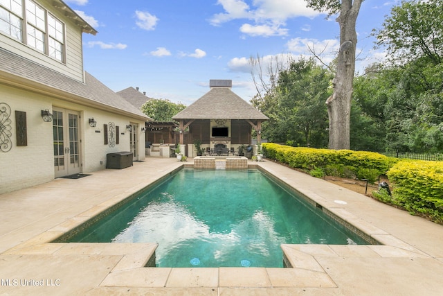 view of pool featuring a gazebo and a patio area