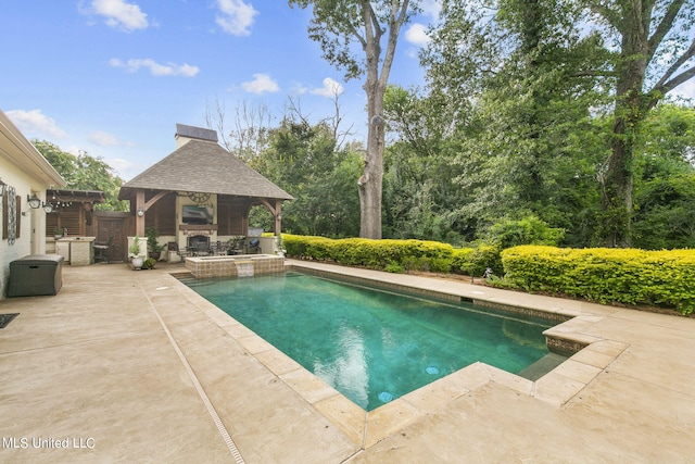 view of swimming pool featuring a gazebo and a patio