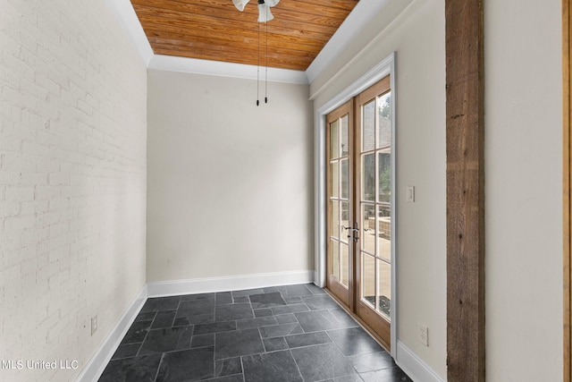 empty room featuring french doors, brick wall, and wooden ceiling