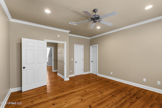 unfurnished bedroom featuring ornamental molding, wood-type flooring, and ceiling fan