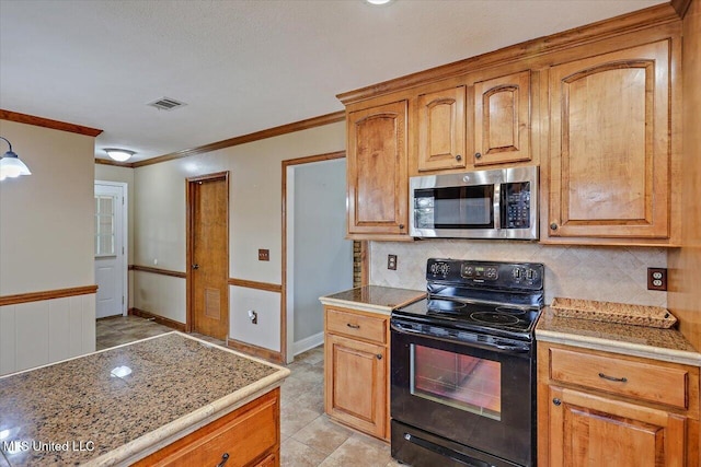 kitchen with electric range, visible vents, decorative backsplash, stainless steel microwave, and ornamental molding