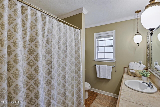 full bath featuring toilet, tile patterned floors, a textured ceiling, vanity, and crown molding