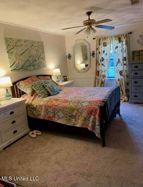 bedroom featuring carpet and ceiling fan