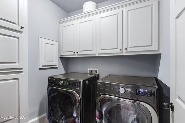 169 Beechwood Cir, Pearl, MS 39208 - laundry area with cabinet space, independent washer and dryer, and baseboards
