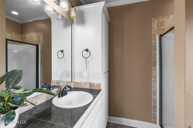 169 Beechwood Cir, Pearl, MS 39208 - full bathroom with crown molding, vanity, and a stall shower