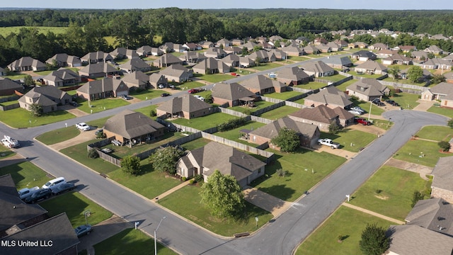169 Beechwood Cir, Pearl, MS 39208 - aerial view of property and surrounding area featuring nearby suburban area and a forest