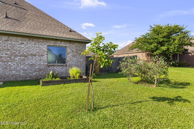 169 Beechwood Cir, Pearl, MS 39208 - view of yard featuring a vegetable garden
