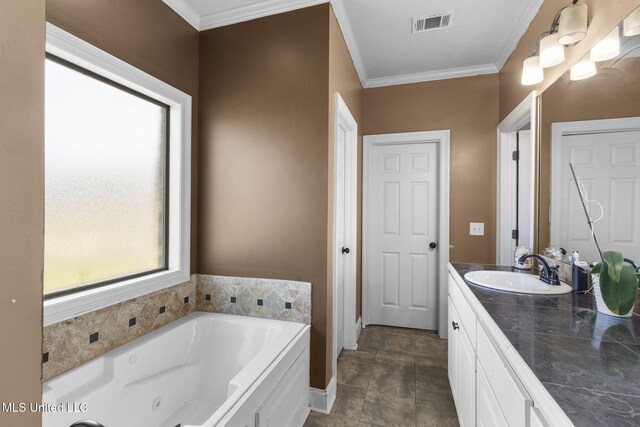 169 Beechwood Cir, Pearl, MS 39208 - full bath with vanity, a whirlpool tub, and crown molding