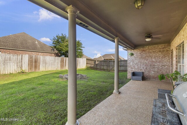169 Beechwood Cir, Pearl, MS 39208 - view of yard featuring a ceiling fan and a patio