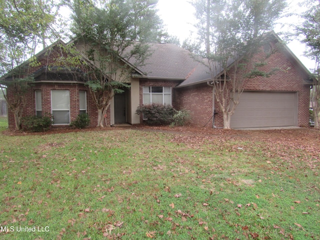 single story home with a front lawn and a garage