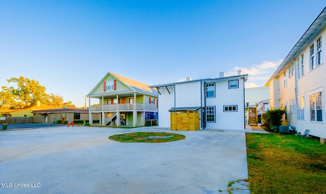 view of front of property featuring cooling unit