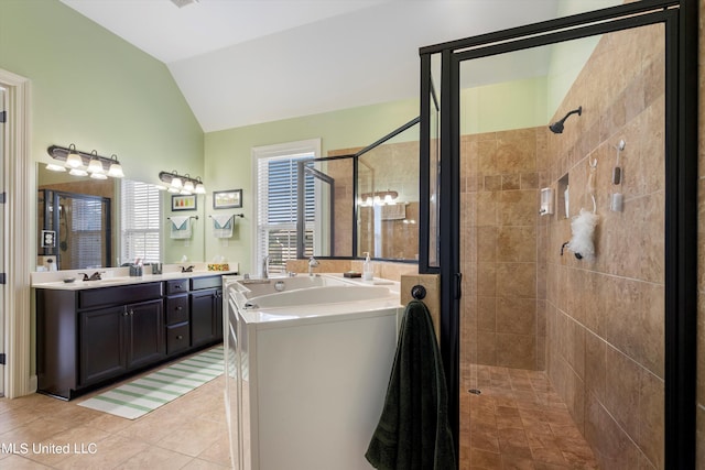 bathroom with vanity, shower with separate bathtub, lofted ceiling, and tile patterned floors