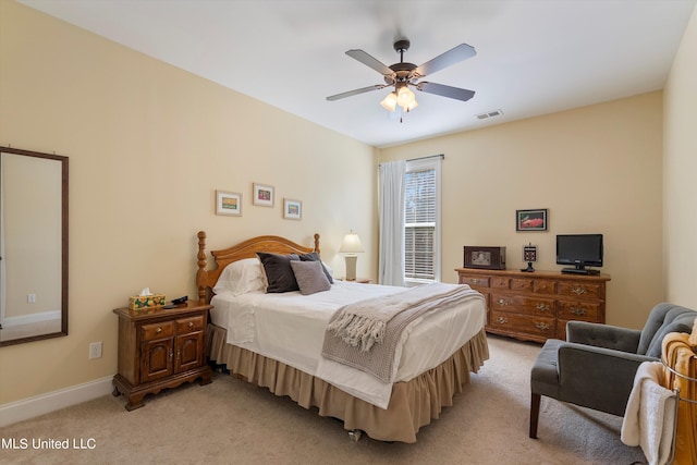 bedroom featuring ceiling fan and light colored carpet