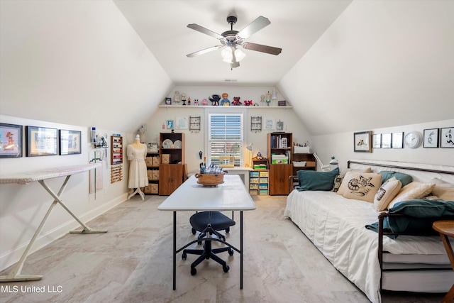 office area with ceiling fan and vaulted ceiling