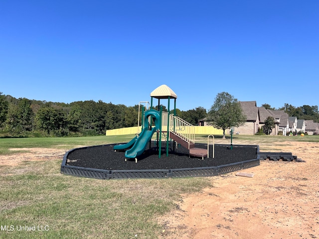 view of playground with a yard