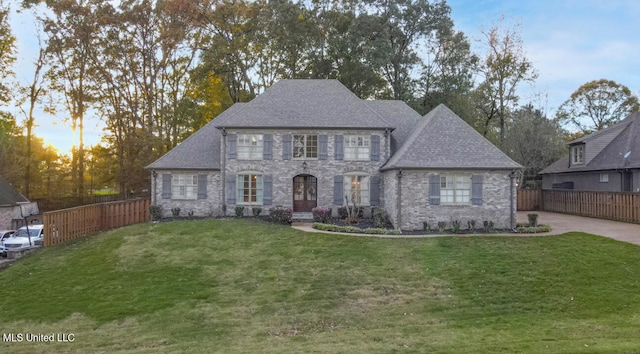 view of front of home with a front lawn