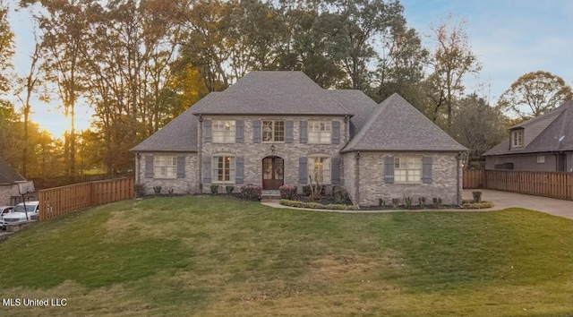 4655 Bonne Terre Dr, Nesbit, MS 38651 - view of front facade featuring stone siding and a shingled roof