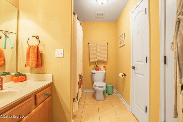 4655 Bonne Terre Dr, Nesbit, MS 38651 - bathroom with vanity, tile patterned floors, toilet, baseboards, and curtained shower