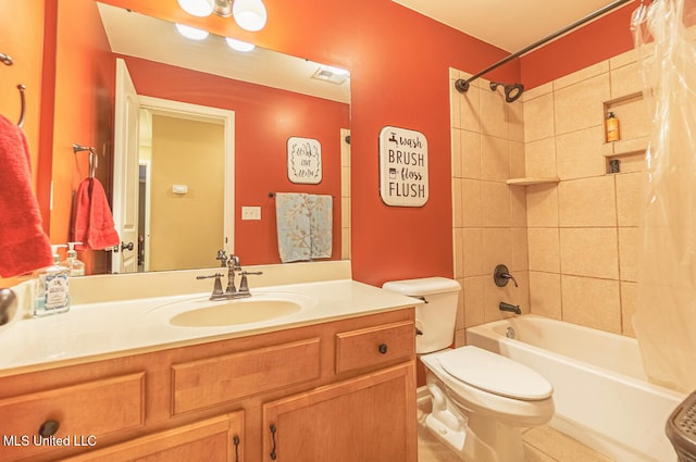 full bathroom featuring tile patterned flooring, vanity, toilet, and shower / tub combo