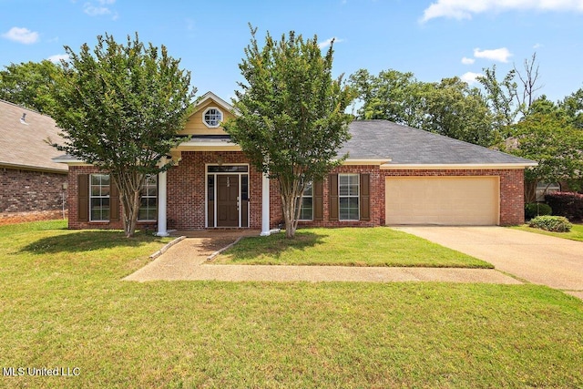 123 Sara Fox Dr, Brandon, MS 39047 - view of front of home with a garage, concrete driveway, a front lawn, and brick siding