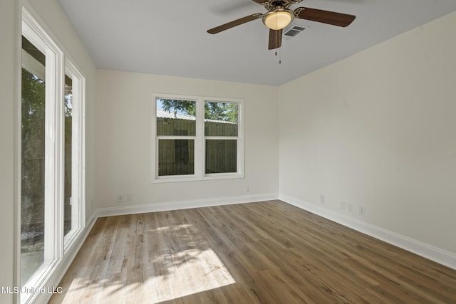 122 Carroll Ave, Long Beach, MS 39560 - unfurnished room featuring wood finished floors and ceiling fan