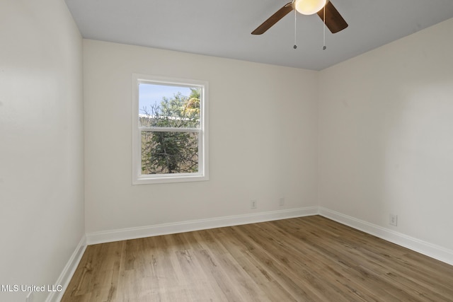 122 Carroll Ave, Long Beach, MS 39560 - unfurnished room featuring wood finished floors and ceiling fan