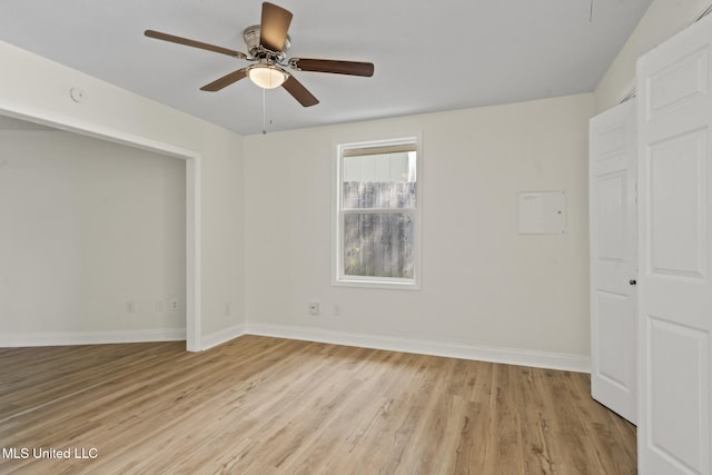 122 Carroll Ave, Long Beach, MS 39560 - unfurnished bedroom with light wood finished floors and a ceiling fan