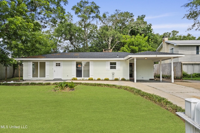 122 Carroll Ave, Long Beach, MS 39560 - view of front facade with driveway and an attached carport