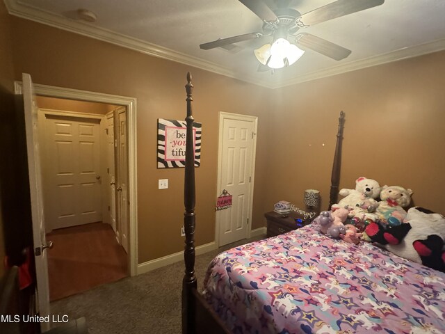 bedroom featuring ceiling fan, carpet, and ornamental molding